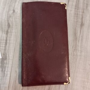 Cartier Dark Red Leather Wallet with Gold Details